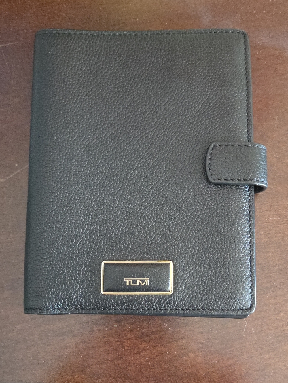 Tumi Black Leather Snap Wallet with Gold Logo Plate